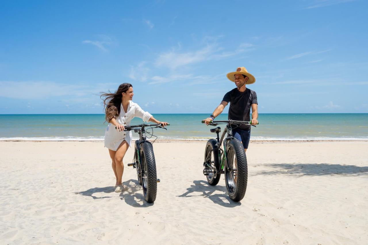 Carmel Cumbuco Resort Εξωτερικό φωτογραφία Biking at the beach